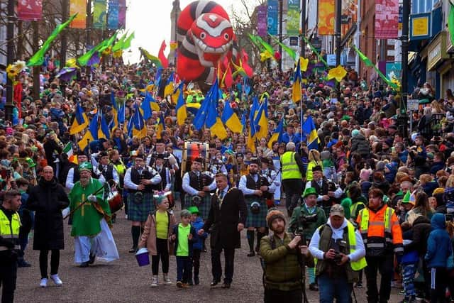 St Patrick leading a previous St Patrick's Day parade down Shipquay Street.