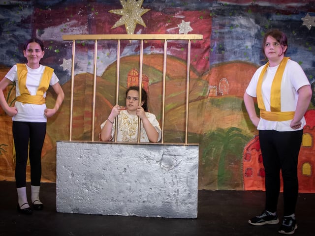 The guards Malak Fatouh and Maegan Doran watching over Joseph ( Hannah Melly) during the Long Tower PS Show.