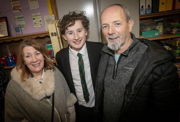 St. Joseph's student Kian McLaughlin pictured with his grandparents John and Marnie. : .