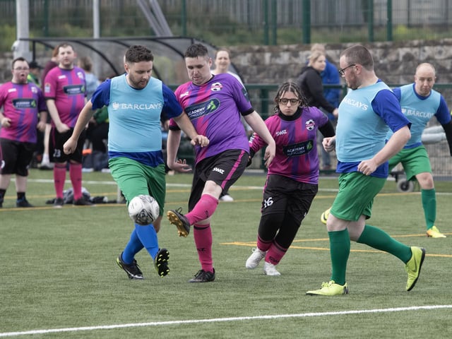 Action from the 'Peace Games' final between Tuned In and Destined at the Waterside Shared Village. (Photo: Jim McCafferty)