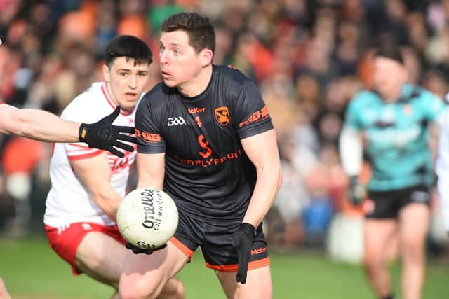Armagh's Paddy Burns gets away from Ben McCarron in the Athletic Grounds on Sunday. (Photo: John Merry)
