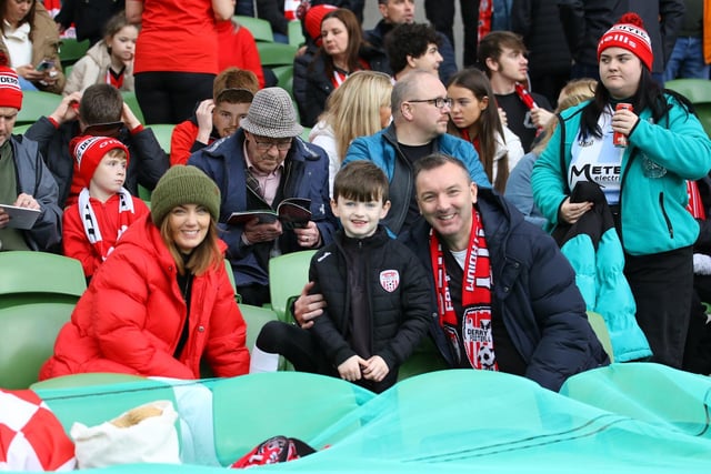 These Derry City supporters get comfortable in their seats at the Aviva as the stadium begins to fill up with 32,000 plus fans eventually packing into the ground to watch Derry be crowned FAI Cup champions.