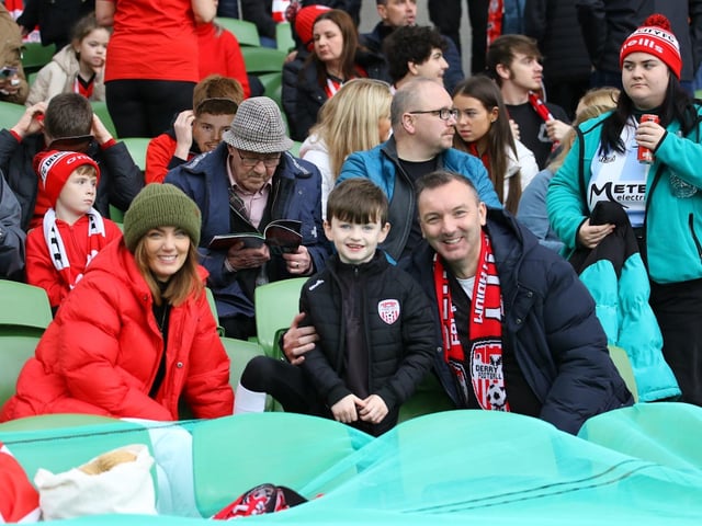 These Derry City supporters get comfortable in their seats at the Aviva as the stadium begins to fill up with 32,000 plus fans eventually packing into the ground to watch Derry be crowned FAI Cup champions.