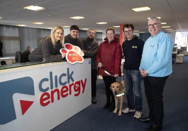 Group pictured at Click Energy, Strand Road, Derry for the launch of the company's new link-up with Guide Dogs as their chosen charity for 2024. Included from left are Rachel O'Donnell, Accounts Manager, Myles Meehan, Customer Services Advisor and Josh McClements, Customer Services Teamleader, Click Energy, Andrea O'Hagan and 'Becky', Mark Quinn, Marketing/Comms Manager and Gary Wilson, Fundraising Manager, Guide Dogs.