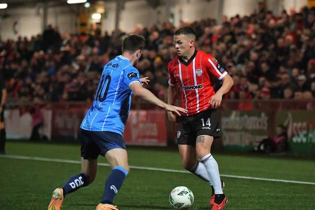 UCD’s Ciaran Behan moves to tackle Derry City’s Ben Doherty during Friday evening’s game at the Brandywell. Photo: George Sweeney
