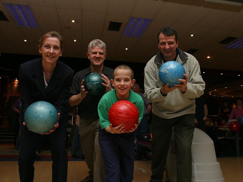 Making the first throw in the BT charity bowling at the Brunswick Superbowl to raise money for the Special Olympics 2003 World Games Host Town Programme are (from left) Paula Armstrong, Project coordinator, Tony Moore, BT customer service manager, David McCauley (15) from Derry, who will be representing the Republic of Ireland in Indoor bowling at the Games and Jim Herron, co-chairperson with the Host Town Programme.
