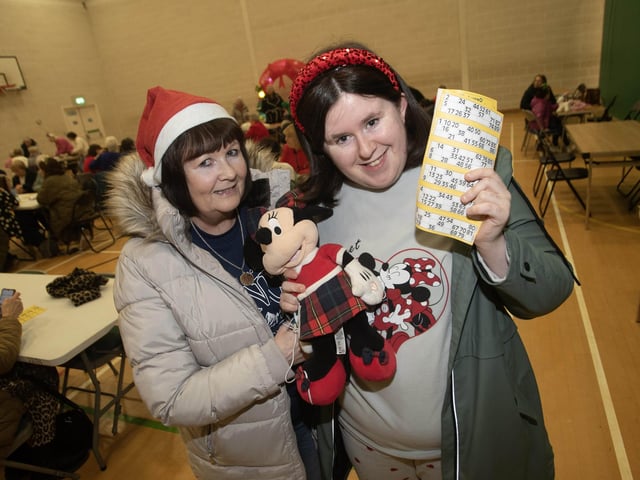 Kelly-Marie Ward and her mum Christine, pictured with Kelly-Marie's favourite lucky mascot Minnie Mouse on Wednesday night. : .