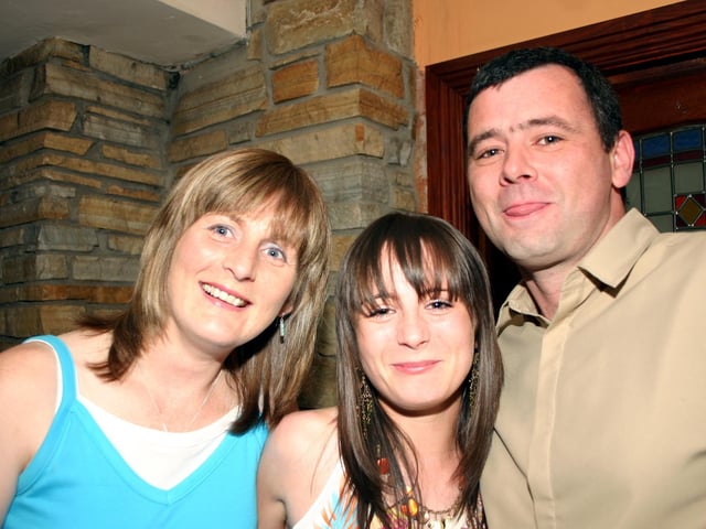 Godparents Cathy and Brian having a good time at the birthday party in Rafters 8411dd : .