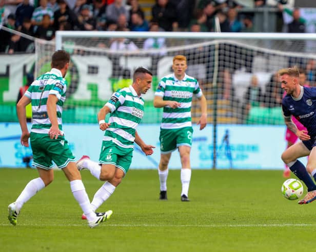Carl Winchester on the ball in Tallaght as Shamrock Rovers midfielder Aaron McEneff closes him down. Photographs by Kevin Moore.