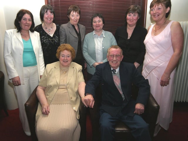 The happy couple Kathleen and Willie pictured with their daughters, Helen, Patricia, Bernie, Noreen, Shiela and Donna 0154JML : Parties and celebrations January 2006: Kathleen and Willie Quigley.
