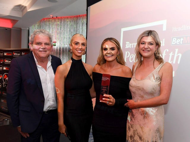 Arts and Culture Icon Award winner Clare McCarron receives her award from Erin McFeely, Alliances and Engagement manager of category sponsor Alchemy and compere Adrian Logan. Included in the photo is Aoife McEleney. Photo: George Sweeney