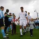 Real Madrid captain gets a warm welcome by the Derry City players.(2208JB70)