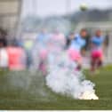 A general view of a flare after being thrown onto the pitch during the SSE Airtricity Men's Premier Division match between Derry City and Bohemians at The Ryan McBride Brandywell Stadium in Derry. Photo by Ramsey Cardy/Sportsfile