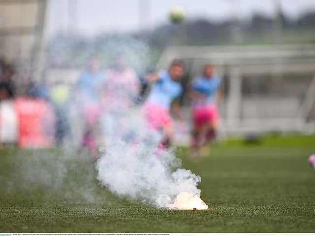 A general view of a flare after being thrown onto the pitch during the SSE Airtricity Men's Premier Division match between Derry City and Bohemians at The Ryan McBride Brandywell Stadium in Derry. Photo by Ramsey Cardy/Sportsfile