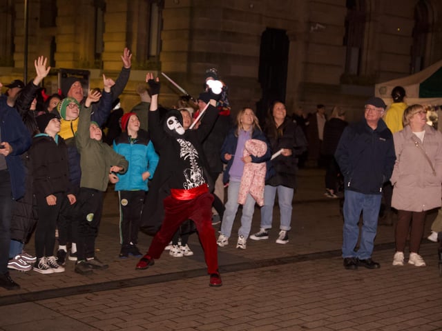 Enjoying the show in the city centre.