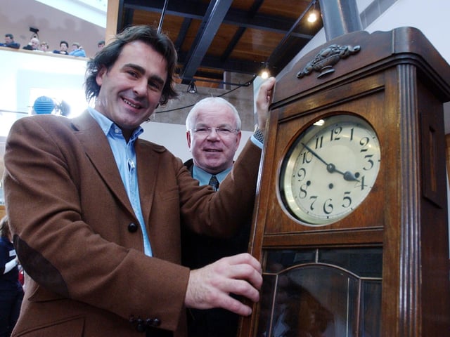 Paul Martin examines a grandfather clock brought along to Flog It!