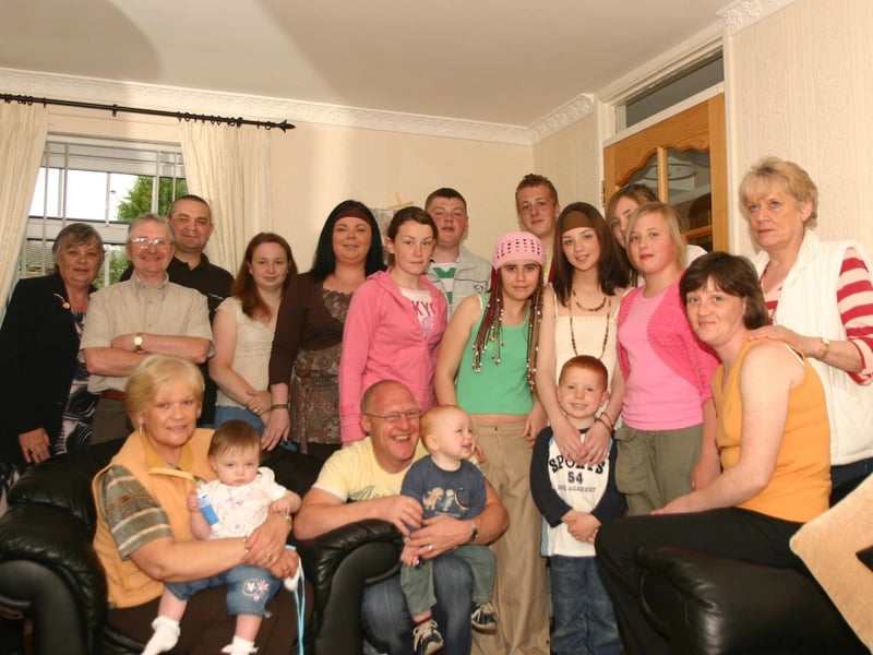 Laomi Donnelly pictured with her family and friends at her party 6949dd : Parties in Derry in July 2005.