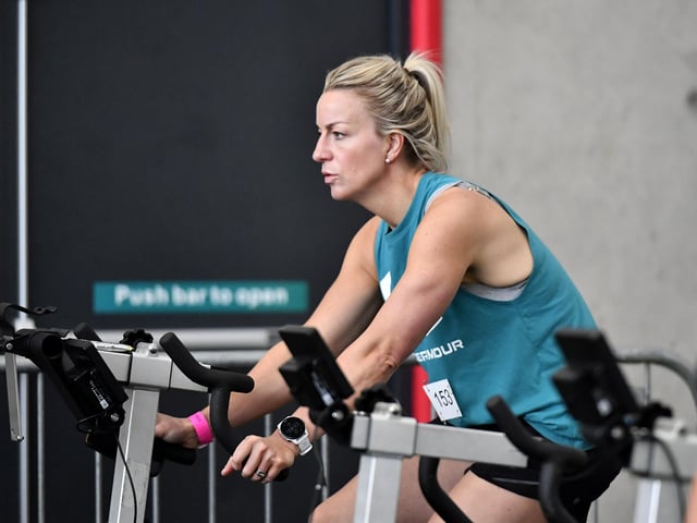 Competitor warming up on the bike erg in the Maiden City Hyrox IV held at Sean Dolans GAC.  Photograph: George Sweeney