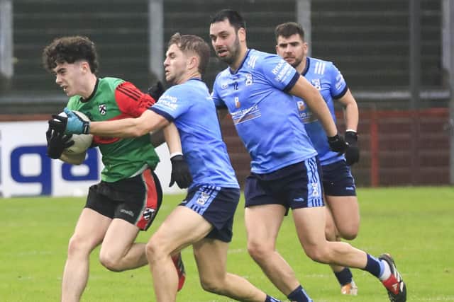 Trasna corner back Thomas Dobbins under pressure in the Ulster GAA Club Junior Football Championship between Doire Trasna v Lacken at Celtic Park on Saturday. (Photo - Tom Heaney, nwpresspics)