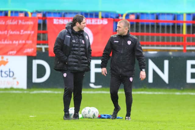 Derry City manager Ruaidhri Higgins and his assistant Alan Reynolds in discussion before kick-off at Tolka Park.