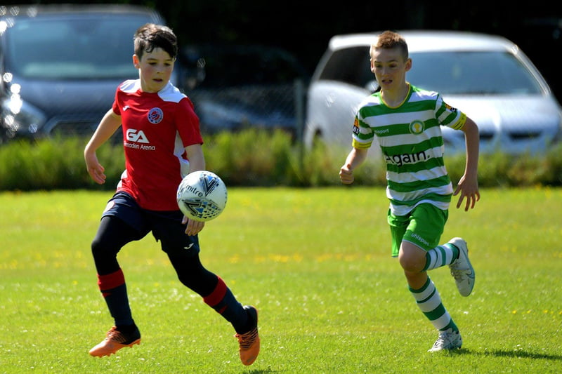 Action from TOTH Celtic against Clooney in the D&D U13 Championship Summer Cup final at Prehen on Sunday morning last. Photo: George Sweeney. DER2322GS - 43