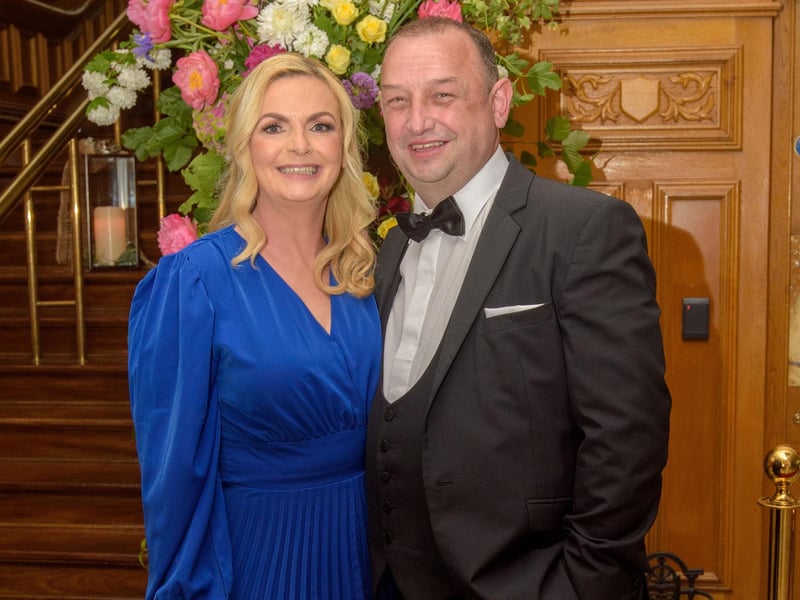 The Mayor Councillor Patricia Logue hosted the annual Mayor’s Ball in the Guildhall in aid of her crossed Charities the Foyle Hospice and Ryan McBride Foundation. Pictured at the event are guests, Lizanne and Councillor Declan Norris. Picture Martin McKeown. 24.05.24