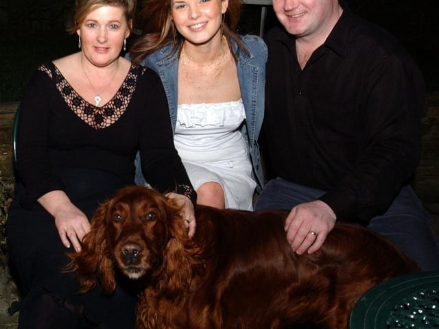 Ciara Carlin, with her Mum Donna and Dad Martin and their dog rusty celebrating her 18th birthday. (0303CG02)                                      :.