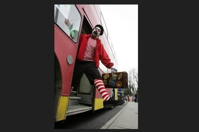 Junior arrives on the Big Red Bus for Kidsclub.