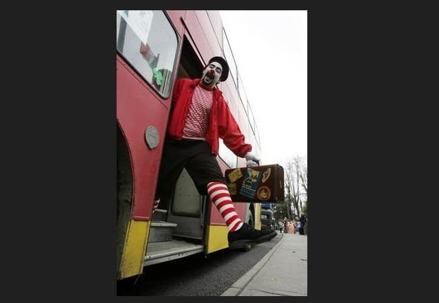 Junior arrives on the Big Red Bus for Kidsclub.