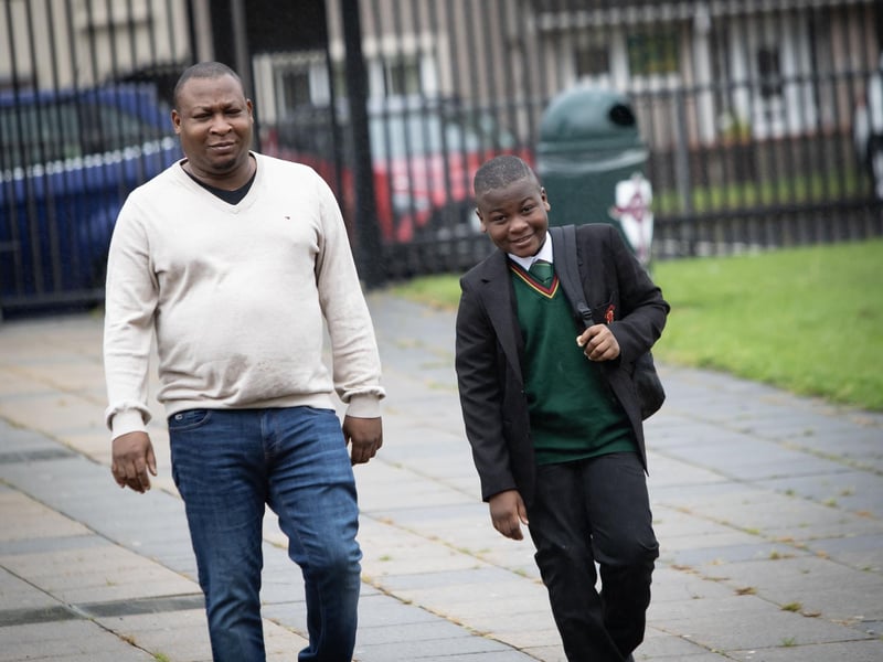 One of the new Year 8 starts at St. Joseph's on Friday morning pictured with his dad.