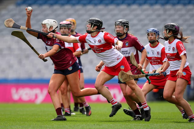 Derry’s Aine McGill and Marie Kelly of Westmeath during Sunday's Very Camogie League Division 2A Final in Croke Park. (Photo: INPHO/Ryan Byrne)