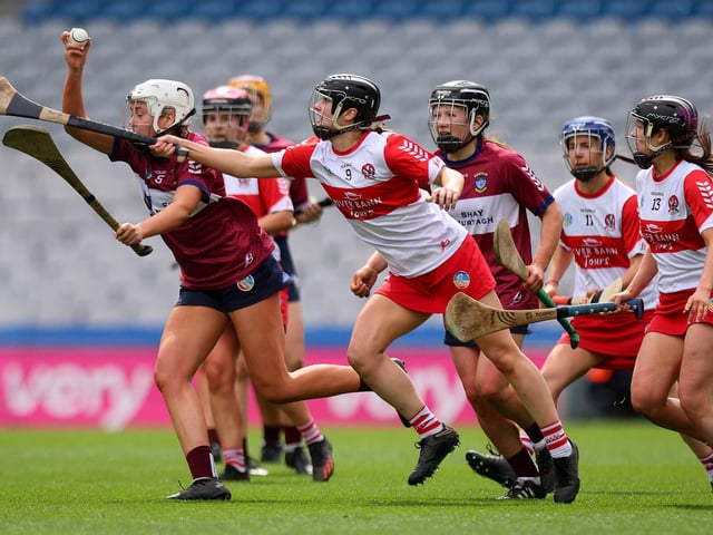 Derry’s Aine McGill and Marie Kelly of Westmeath during Sunday's Very Camogie League Division 2A Final in Croke Park. (Photo: INPHO/Ryan Byrne)