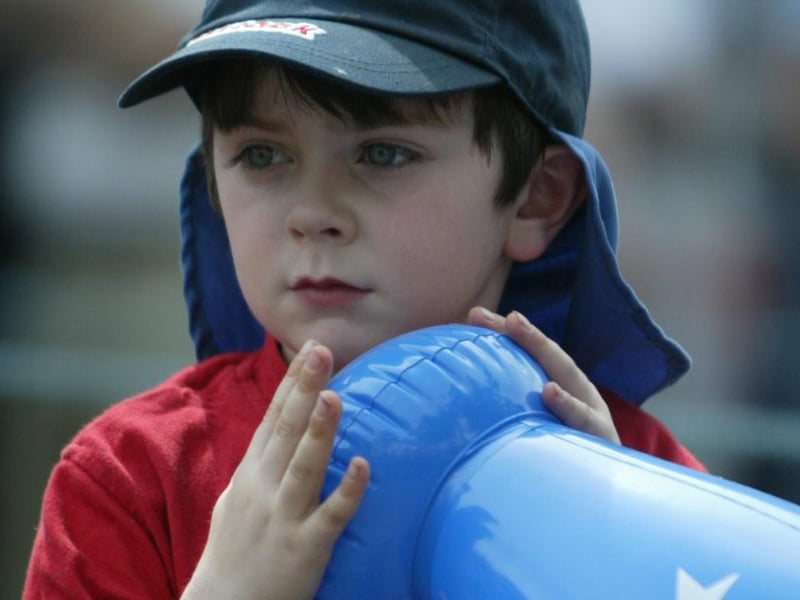 Shane Farrell keeps his concentration as the carnival passes by at the Hiring Fair Festival in Strabane.