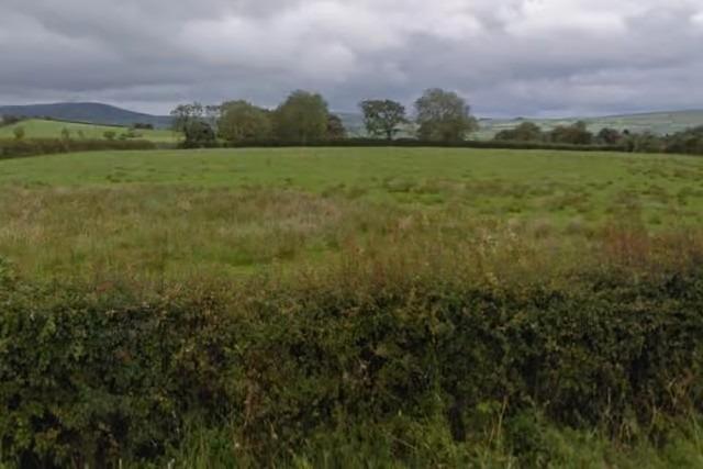 The greenbelt site, as it formerly looked, begins at 64 Mullenan Road and runs down over former farmland towards the River Foyle and the Ballougry Road.