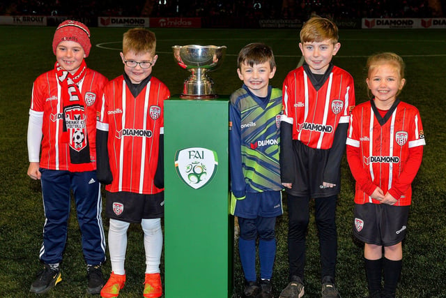 Mascots pictured with the FAI Men’s President’s Cup. Photo: George Sweeney. DER2307GS – 60