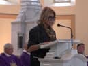 Roma Downey giving the first reading at her late brother, Fr. John Downey's Funeral Mass in Moneyneena on Thursday.