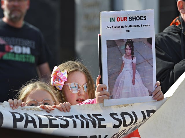 Children carry a photograph of murdered Palestinian girl, 8 years old Aya Ahmad Herbi Alkahlot, at the Freedom for Palestine march and rally held on Saturday afternoon.  Photo: George Sweeney