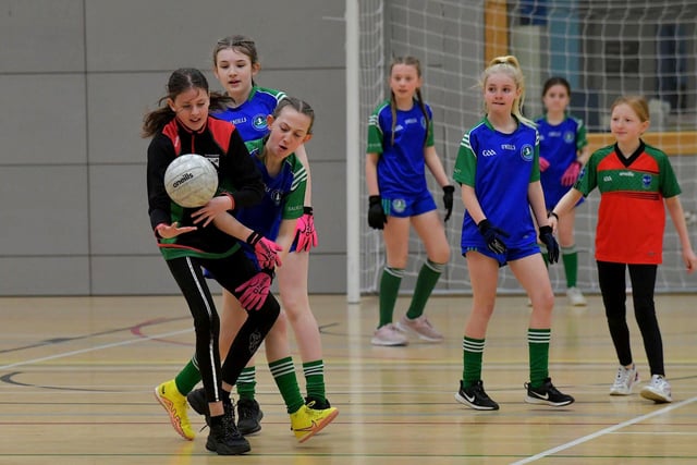 Chapel Road battle with Sacred Heart 'A'  in the Derry City Primary School Girls’ Indoor Gaelic Finals Day at the Foyle Arena on Friday afternoon. Photo: George Sweeney. DER2308GS –114