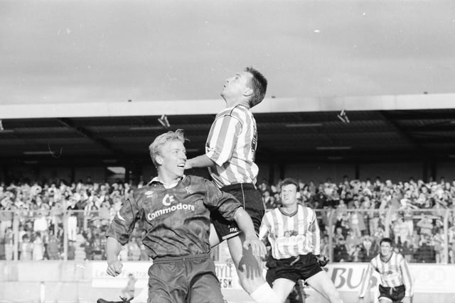 Paul Curran rises above Joe Allon