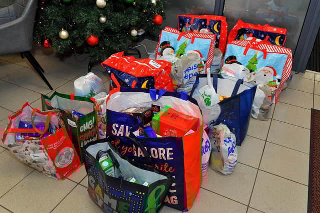 Donations ready for distribution at the Foyle Foodbank distribution centre in Springtown Industrial Estate. Photo: George Sweeney. DER2250GS – 25
