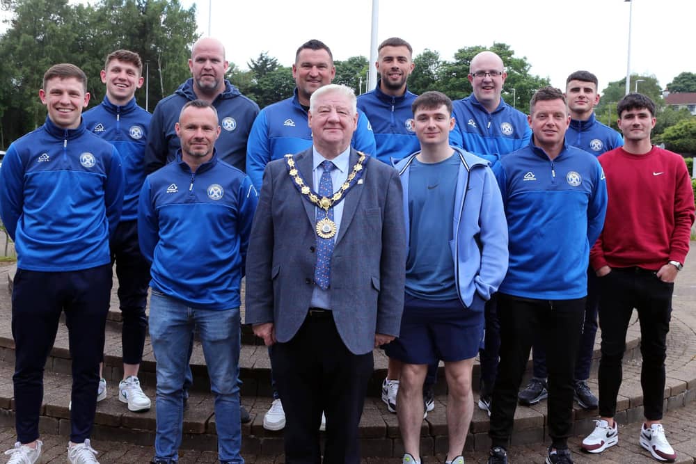 The Mayor, Cllr Steven Callaghan, with members of Limavady United FC's playing, coaching and backroom staff.