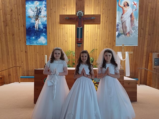 Culmore Primary School pupils Brooke Kelly, Kyra Martin and Emily-Mae Furey, who made their First Holy Communion on May 20 at Our Lady of Lourdes Chapel, Steelstown.  Fr Clerkin led the ceremony and the pupils' teacher is Mrs Mary Nash.