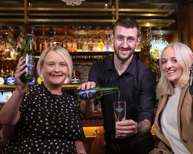 DRIVING HOME FOR CHRISTMAS: With the Christmas party season fast approaching, Craigavon-based drinks distributor United Wines has launched details of its festive Designated Driver campaign to help Northern Ireland revellers enjoy the party season and get home safe. Starting from November 18, the initiative will see partygoers who volunteer themselves as a designated driver rewarded with a free Heineken®0.0 or Birra Moretti Zero when they make themselves known to bar staff by showing their car keys at participating venues. Launching the safe driving campaign are Gemma Herdman (left) and Maura Bradshaw of United Wines, with Willy Erwin of The Lansdowne on Antrim Road, Belfast.