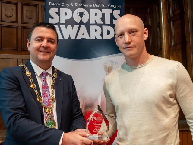 The Mayor, Councillor Ruairí McHugh, presents James McFadden from Strabane Shotokan Karate Club, with the Performance Coach of the Year award as he hosted the annual Derry City and Strabane District Council Sports Awards in the Guildhall. Picture Martin McKeown. 05.06.25