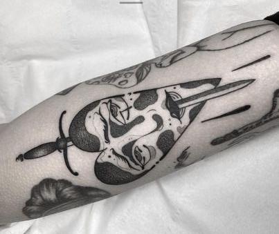 Alex is 24, originally from Poland but then moved to Ireland as a young kid. "I started my tattooing journey in 76 Tattoo House 5 years ago, and recently relocated to Belfast to work in Croí Dubh Tattoo.Art was always something that played a huge part in my life. Originally it wasn’t a career ever imagined myself in. It wasn’t until I was 18 years old, my friends convinced me to finally apply for apprenticeships. 5 years later I cannot imagine myself doing anything else. It’s definitely very hard to choose a favourite tattoo, but it would have to be this heart tattoo as I was given full artistic freedom! Every tattoo I do gives me so much joy and I’m forever thankful that my clients trust me with tattooing them!"