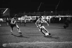 Dónal O'Brien closes down Michael Hughes.