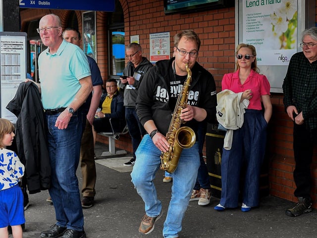 The Jaydee Brass Band’s Sam Thomas playing at the Foyle Street Bus station. Photo: George Sweeney