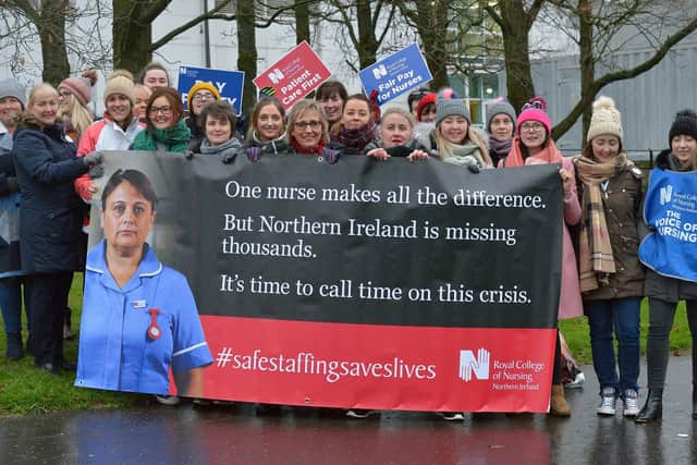 2019: Nurses from the Royal College of Nursing union strike at Altnagelvin Hospital three years ago this week. DER5119GS - 007