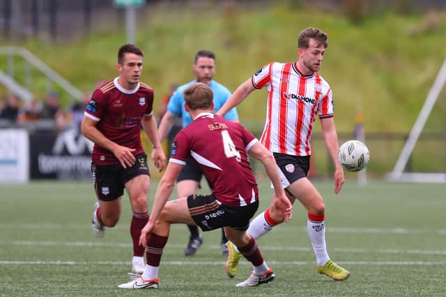 Derry City's Will Patching makes his way past Galway United's Robert Slevin at Brandywell. Photographs by Kevin Moore.