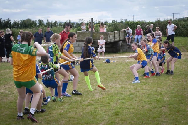 Burt coach Ciaran Kelly oversees a tug of war competition between two of the groups at the Burt GAC Skills/Fun Day on Sunday last. (Photos: Jim McCafferty Photography)
